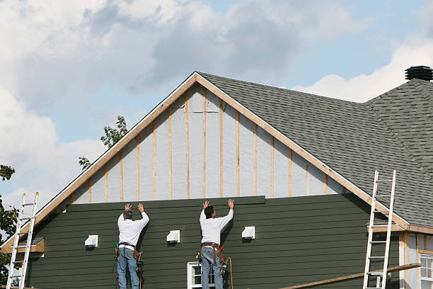 Professional Siding Contractor technician working in Winston-Salem, NC